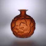 René Lalique — A very fine amberred ‘Ormeaux’ vase by Lalique