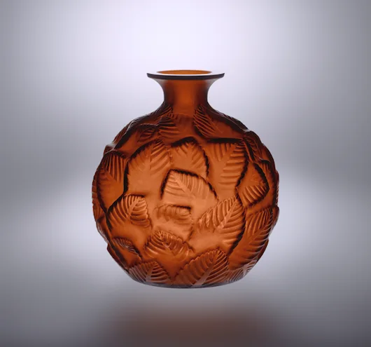 René Lalique — A very fine amberred ‘Ormeaux’ vase by Lalique