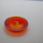 René Lalique — An exclusive and rare orange ‘Deux Zephyrs’ by Lalique — detail 3