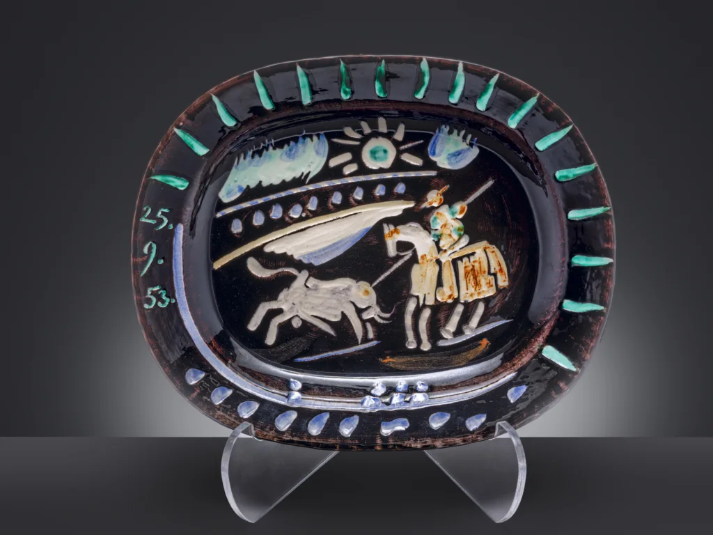 Pablo Picasso (1881-1973) — A rare 'Corrida Sun' plate designed by Picasso
