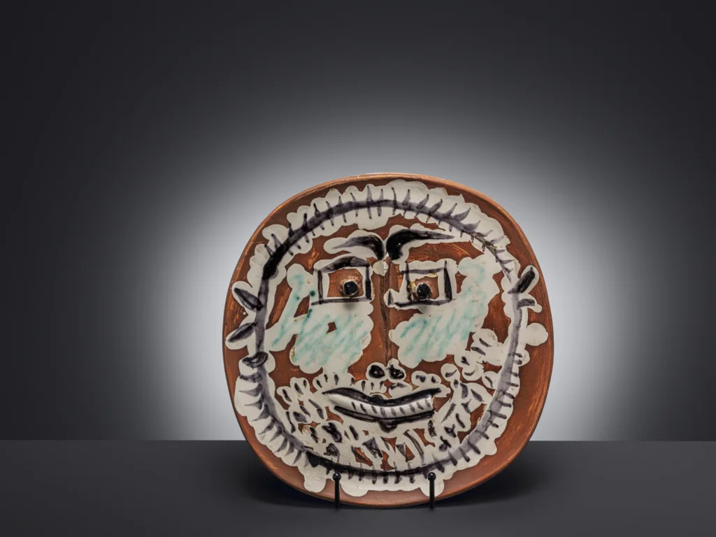 Pablo Picasso (1881-1973) — An amusing ‘Squared Eyed Face' plate by Picasso