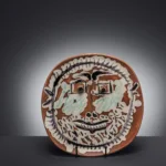 Pablo Picasso (1881-1973) — An amusing ‘Squared Eyed Face' plate by Picasso